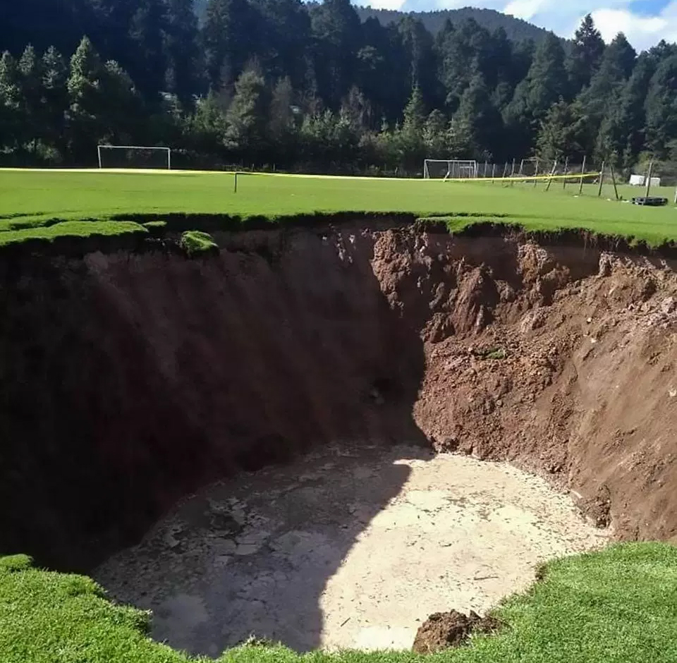 Giant Sinkhole Appears On Pitch