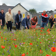Celebrating Electricity North West’s ‘Transforming our Spaces’ project at the Smithfields substation in Egremont, including Angie Thornton, Electricity North West’s Groundworks Delivery Manager (far left) and Top Green’s Euroflor consultant Howard Wood (third left)