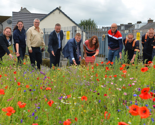 Celebrating Electricity North West’s ‘Transforming our Spaces’ project at the Smithfields substation in Egremont, including Angie Thornton, Electricity North West’s Groundworks Delivery Manager (far left) and Top Green’s Euroflor consultant Howard Wood (third left)