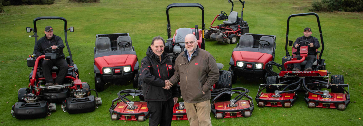 Rushmere Golf Club’s secretary manager Bob Tawell, centre left, shakes hands with Reesink’s Julian Copping and is joined by greenkeepers Michael Buck, left, and David Driver.